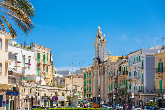Italy, Apulia, Metropolitan City of Bari, Molfetta. Street scene of Via San Domenico and Church of St. Domenico.