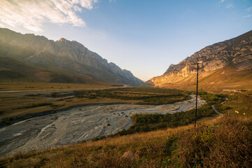 Obraz premium Golden sunset at the mountains 