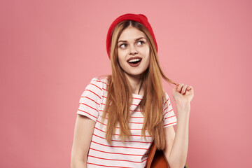 Cheerful woman striped t-shirt fashion studio pink background