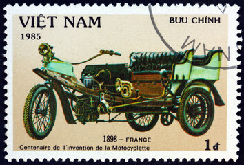 Fototapeta na wymiar Postage stamp Vietnam 1985 tricycle from France
