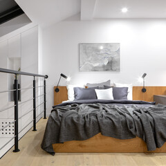 Simple bedroom in mezzanine - obrazy, fototapety, plakaty