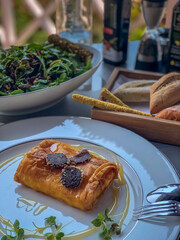 enjoy lunch outdoors Spinach pie with chorizo sausage, bread for the welcome, and green salad 