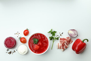 Concept of tasty eat with borscht and ingredients on white background
