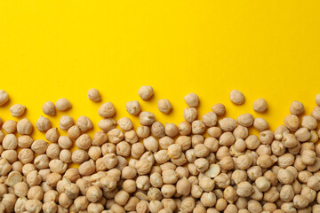 Fresh chickpea on yellow background, space for text