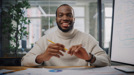 Point of View from Camera with Handsome Young Black Project Manager Making a Video Call in Creative...
