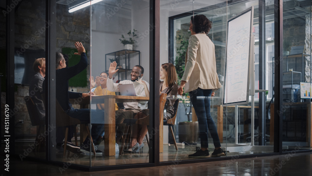 Aufkleber Project Manager Makes a Presentation for a Young Diverse Creative Team in Meeting Room in an Agency. Colleagues Sit Behind Conference Table and Discuss Business Development, User Interface and Design.