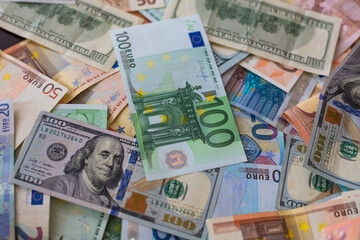 Obraz na płótnie Canvas dollar and euro banknotes