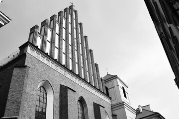 Brick gothic style Archcathedral Basilica of the Martyrdom of St. John the Baptist in Warsaw Old Town (Stare Miasto), Poland. Black and white photo