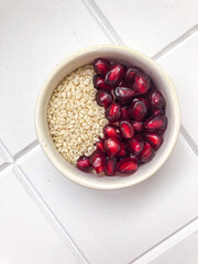 garnet and sesame seed in a bowl