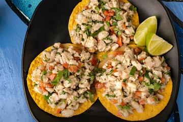 Mexican tortilla tostada with fresh ceviche seafood