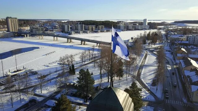 Aerial view of Finnish flag on the tower of Town Hall in Joensuu, Finland.