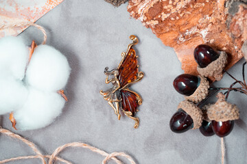 A brooch in the form of a fairy close-up. High quality photo