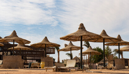 An empty beach in Egypt during the COVID 19 pandemic. The Red Sea coast, a recreation area without people.