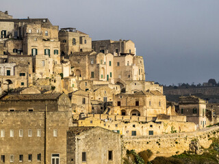 Naklejka premium The cave dwelling town of Matera with its Sassi houses.