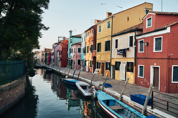 Fototapeta na wymiar Bright colorful houses and buildings in Burano - streets of venice