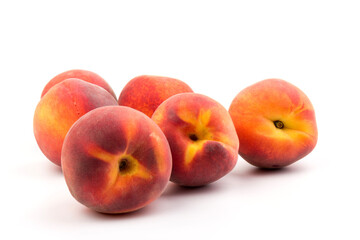 Summer fruit background. Ripe juicy peaches on white background. Copy space. Fresh organic fruit vegan food. Harvest concept