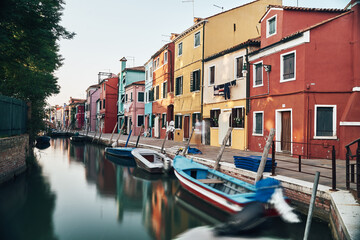 Fototapeta na wymiar Bright colorful houses and buildings in Burano - streets of venice