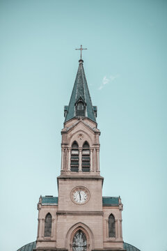 Le V&eacute;sinet, France 19-02-2021: the top of the church during sunset in Paris
