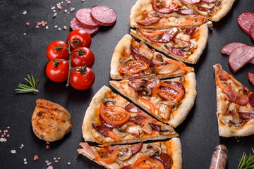 Fresh delicious pizza made in a hearth oven with sausage, pepper and tomatoes