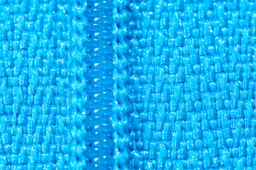 Light blue nylon zipper for clothing and fashion accessories.