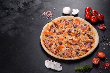 Fresh delicious pizza made in a hearth oven with tomatoes, sausage and mushrooms
