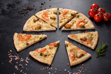 Fresh delicious pizza made in a hearth oven with shrimp mussels and other seafood