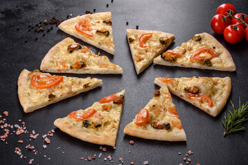 Fresh delicious pizza made in a hearth oven with shrimp mussels and other seafood