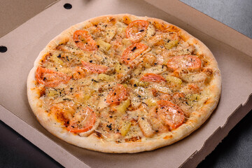 Fresh delicious pizza made in a hearth oven with shrimp mussels and other seafood