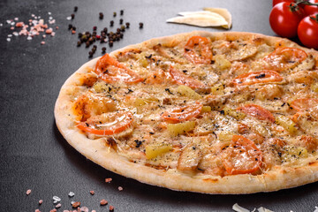 Fresh delicious pizza made in a hearth oven with shrimp mussels and other seafood