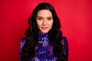 Photo of serious gorgeous young pretty lovely woman brunette wavy hair isolated on red color background © deagreez