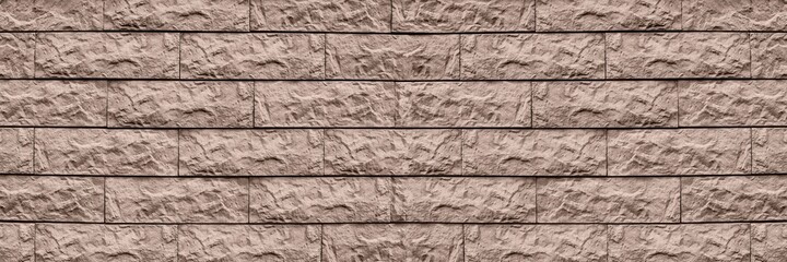 Light brown rough brick block texture. Beige tile wall abstract vintage background