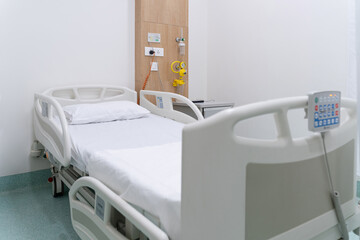 Hospital room with bed and medical equipments
