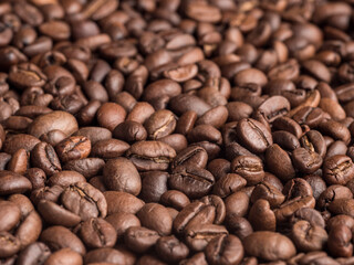 Macro photo of roasted arabica coffee beans.