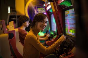 Couple having fun in playroom. Playing a games.