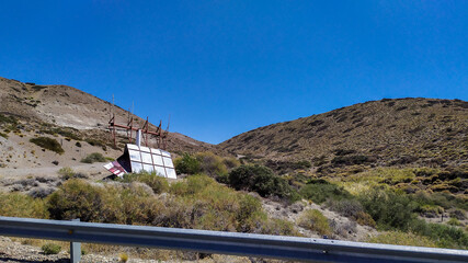 Fallen billboard on the side of the road
