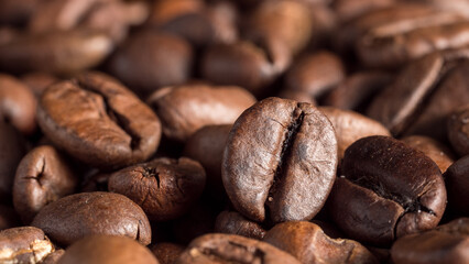 Macro photo of roasted arabica coffee beans.