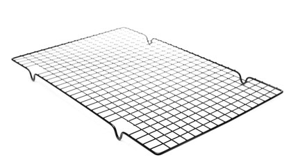 Black metal table trivet, kitchen plate and pan holder isolated on white background