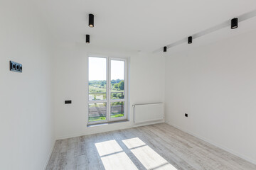 Obraz premium interior photo, apartment after new renovation without furniture in loft style