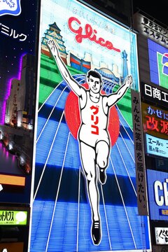 OSAKA, JAPAN - APRIL 24, 2012: Glico Man neon in Osaka, Japan. Existing since 1935, Glico Man is one of most recognized neons worldwide.