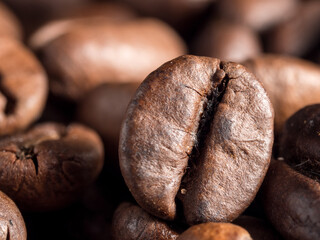 Fototapeta premium Macro photo of roasted arabica coffee beans.