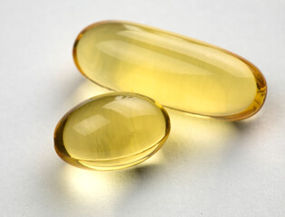 Omega 3 capsules on white background. Health care concept.