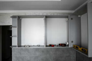 Custom kitchen cabinets installation without a furniture facades mdf. Gray modular kitchen from...