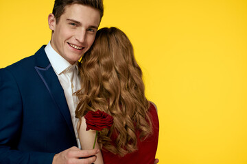 Cute couple dating hug romance yellow background