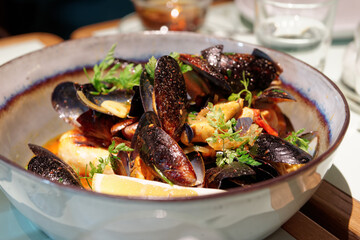Mussels in a deep clay bowl