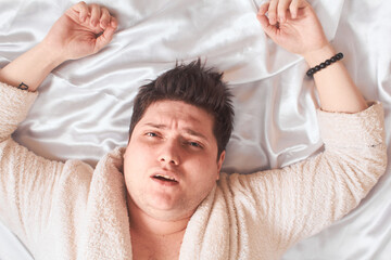 Caucasian Man Lying Bed White High Key, Close-Up