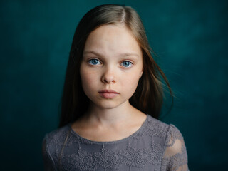 beautiful girl loose hair dark background cropped view close-up