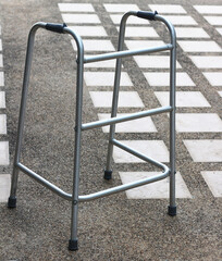 walking with aluminum walker for safety at home.