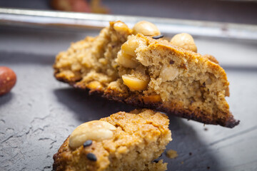 Broken crispy peanut butter cookies. Homemade vegan dessert. Vegan and vegetarian healthy food.