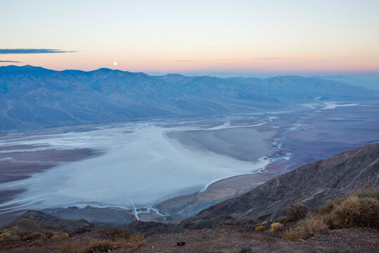 View by moonlight over Badwater Basin to the Panamint Range, Dante's View, Death Valley National Park, California