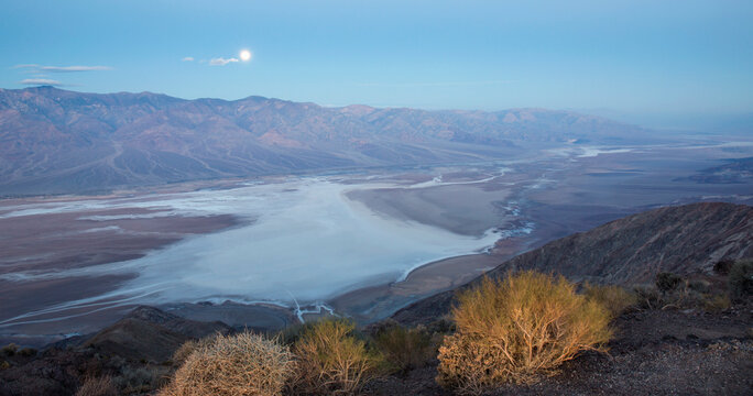 Panoramic view by moonlight over Badwater Basin to the Panamint Range, Dante's View, Death Valley National Park, California